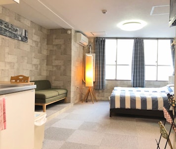 A fully furnished apartment located in Namba, Osaka.